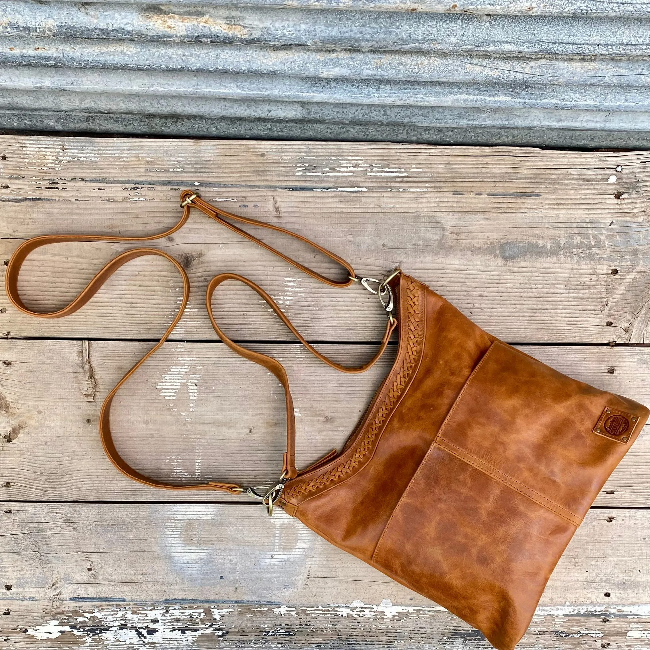 A Two Pocket Leather Bucket Bag